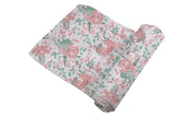 Desert Rose Swaddle featuring a beautiful rose design, soft and breathable fabric for cozy baby comfort.