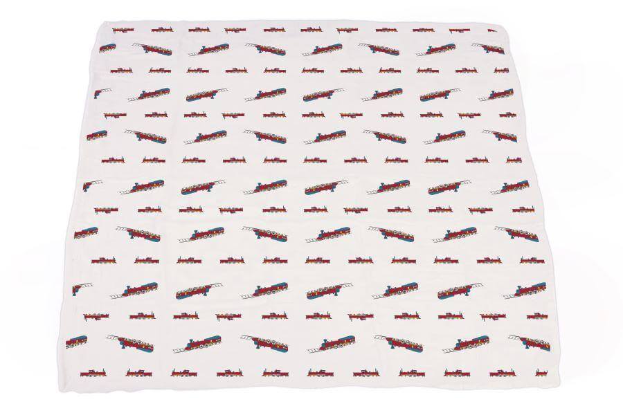 Vintage Train Blanket featuring colorful train designs on a soft white fabric.