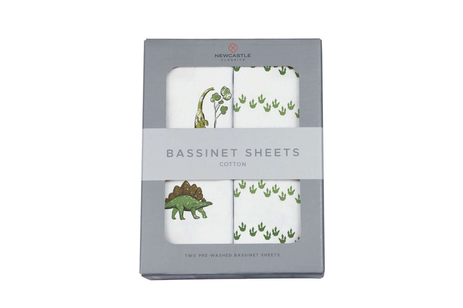 Dino Cotton Pad featuring playful dinosaur prints in a boxed set of cotton bassinet sheets.