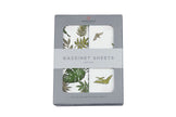 Tropical Pteranodon bassinet sheets packaging featuring durable cotton material for babies' sensitive skin.