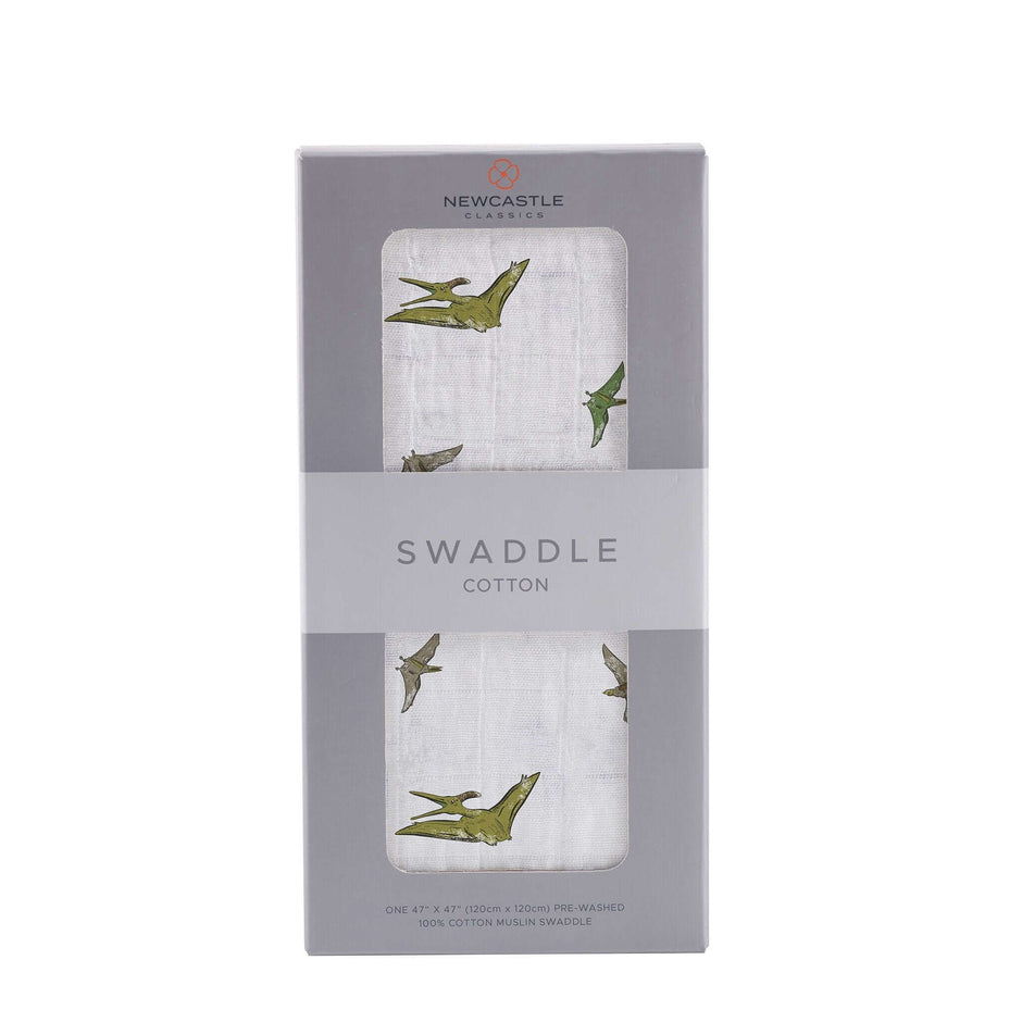 Pteranodon Cotton Swaddle packaging with playful dinosaur prints for babies.