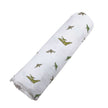 Pteranodon cotton swaddle featuring playful dinosaur prints for babies, perfect for cozy naps.