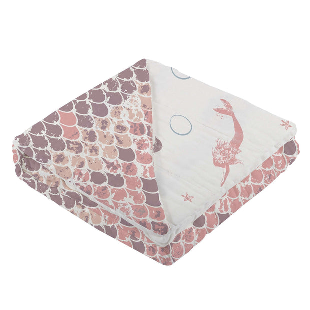 Mermaid Scales Blanket showcasing whimsical mermaid and scales pattern for playful decor.