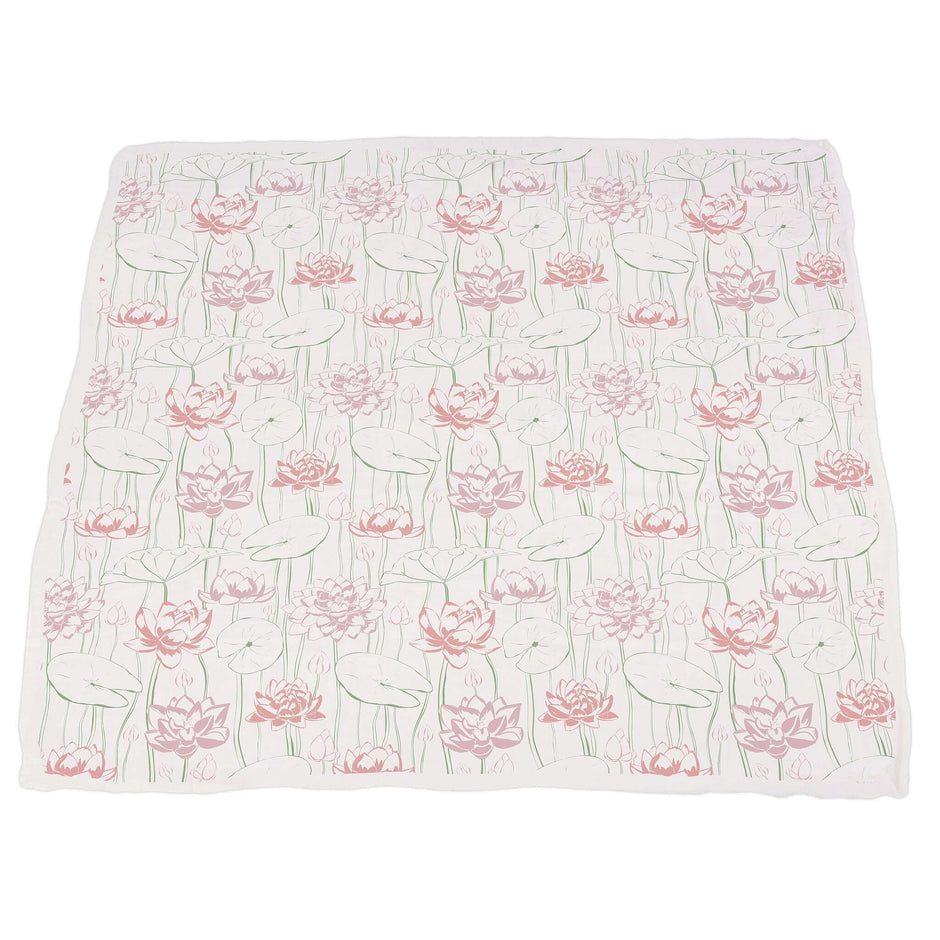 Soft Turtles and Water Lily Bamboo Muslin Blanket with pink flowers and green leaves design.