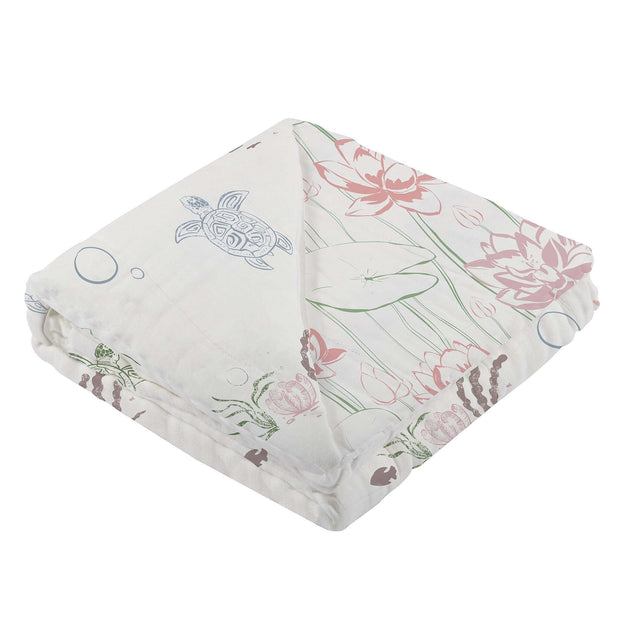 Turtles Lily Blanket made of 100% bamboo, featuring soft turtles and water lilies, perfect for wrapping your baby in comfort.