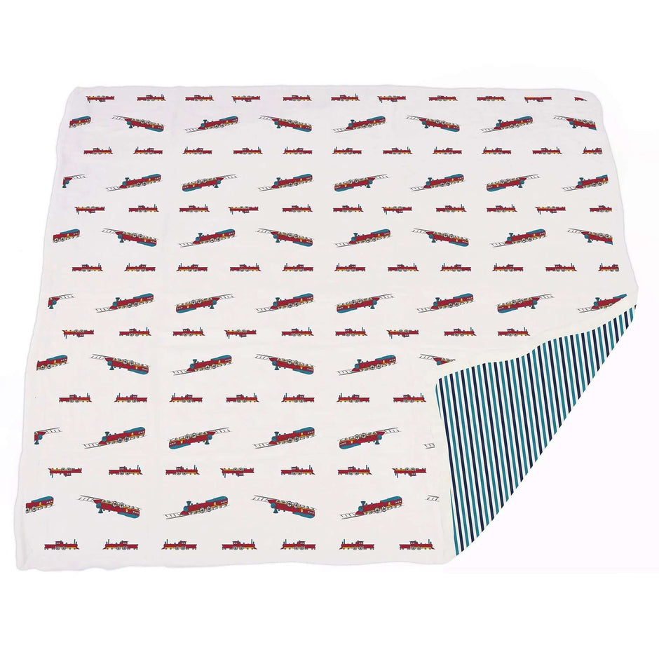 Vintage Train Blanket featuring a playful train pattern on a soft fabric, ideal for cozying up.