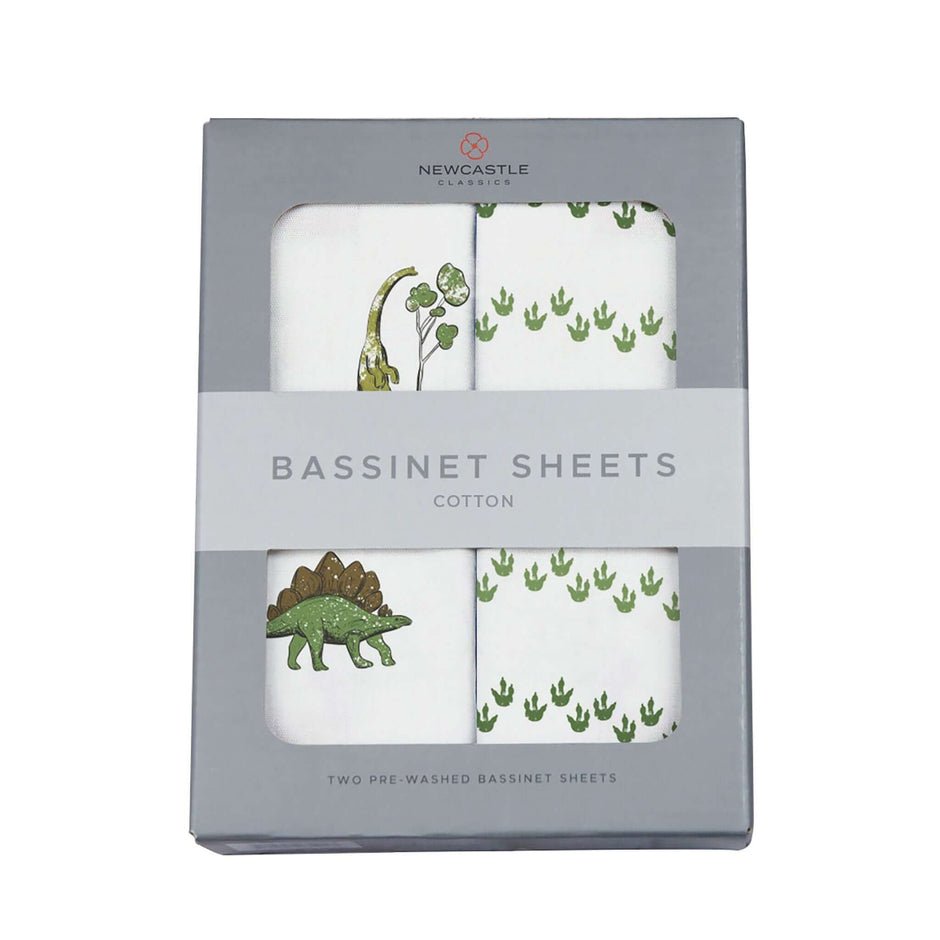 Dino cotton bassinet sheets featuring playful dinosaur prints in a packaged set. Durable and soft for baby comfort.