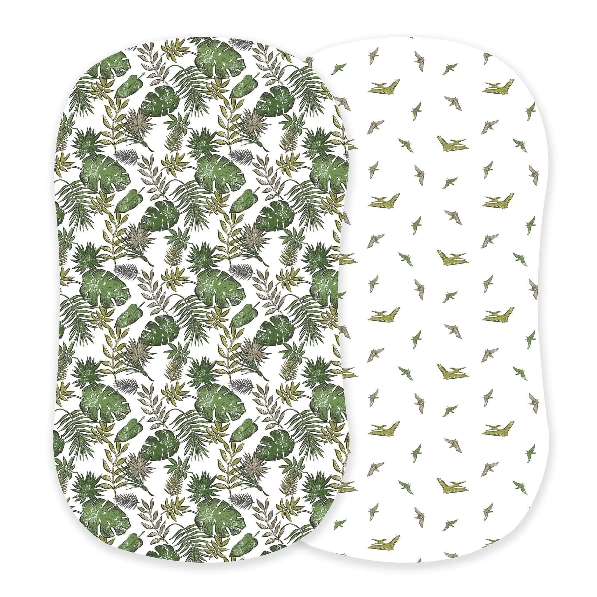 Tropical Pteranodon Cover featuring durable cotton, one side with green leaves and the other with playful bird patterns.