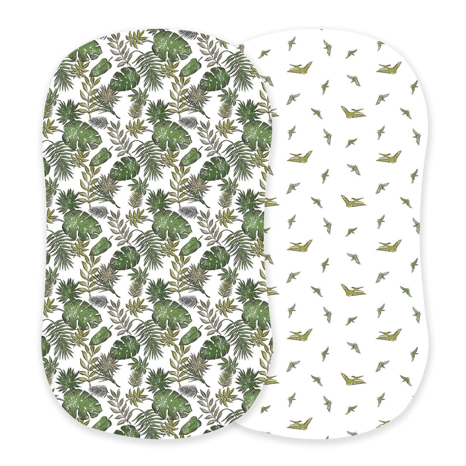 Tropical Pteranodon Cover featuring durable cotton, one side with green leaves and the other with playful bird patterns.