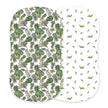 Tropical Pteranodon Cover featuring durable cotton, one side with green leaves and the other with playful bird patterns.