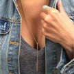 Collier à barre verticale