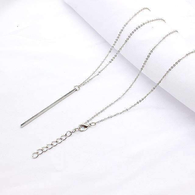 Collier à barre verticale