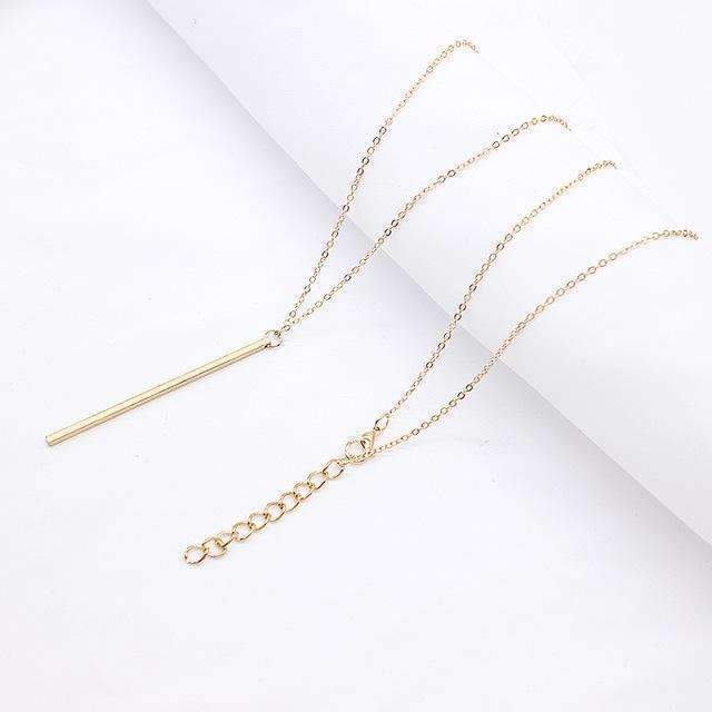Collier à barre verticale