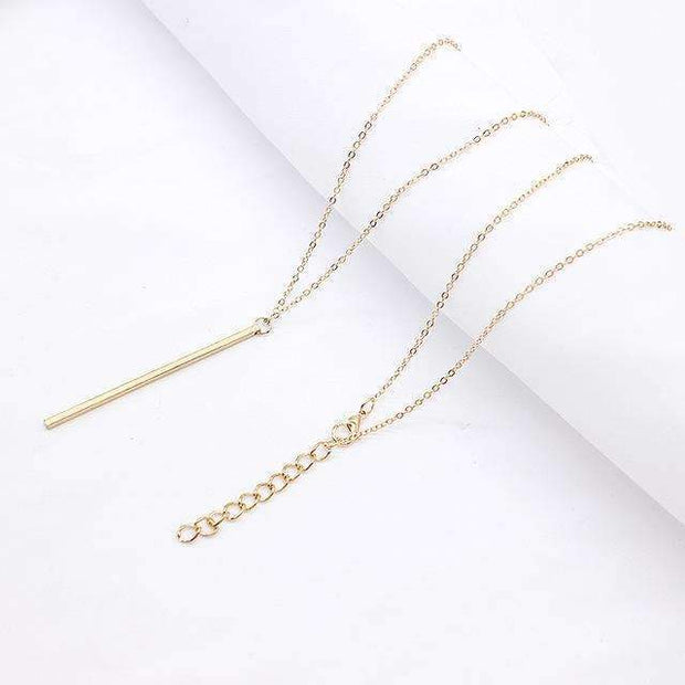Collier à barre verticale