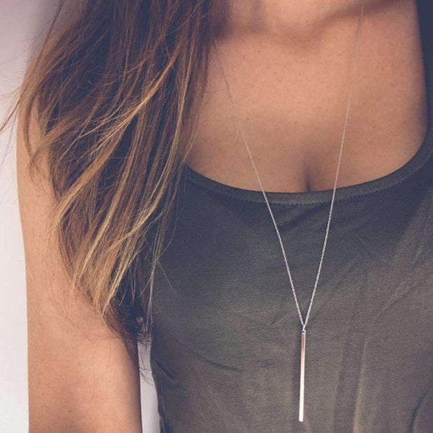 Collier à barre verticale