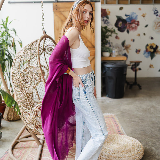 Kimonos à bordure effilochée.