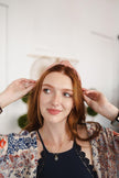 Diadema con moño a rayas